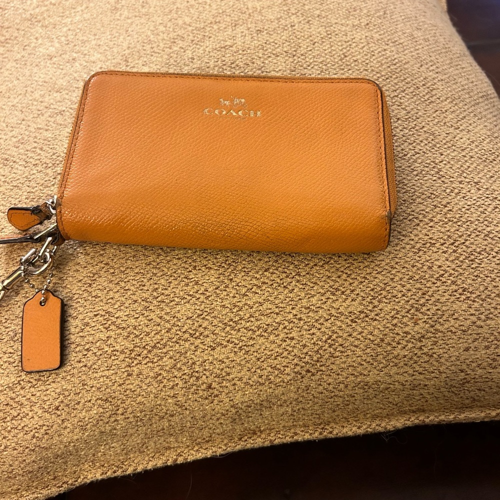 Coach wallet with carrying strap and 2 zip compartments